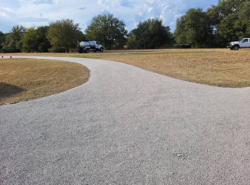 Winding road with seal coat - Zook Services
